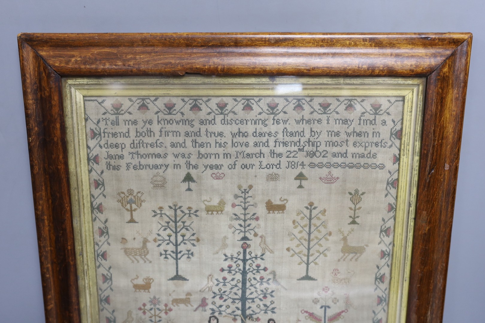 A George III Adam and Eve cross stitch sampler, worked by Jane Thomas 1814, 37x28cm